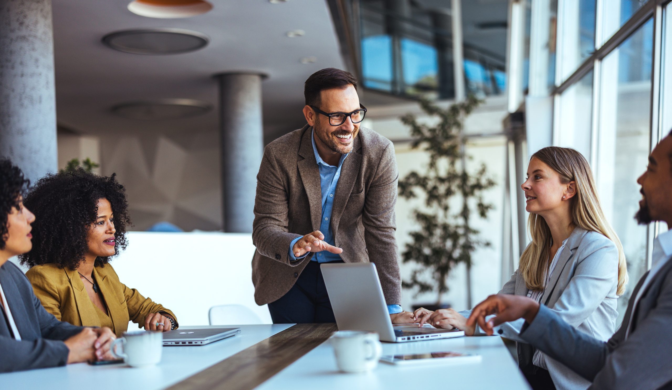 Leader leading collaboration During a Business Meeting in a Modern Workplace Environment